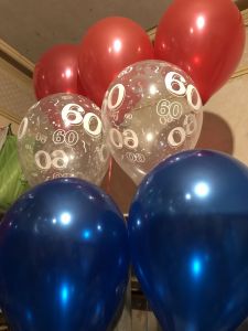 60th clear with red and blue balloons
